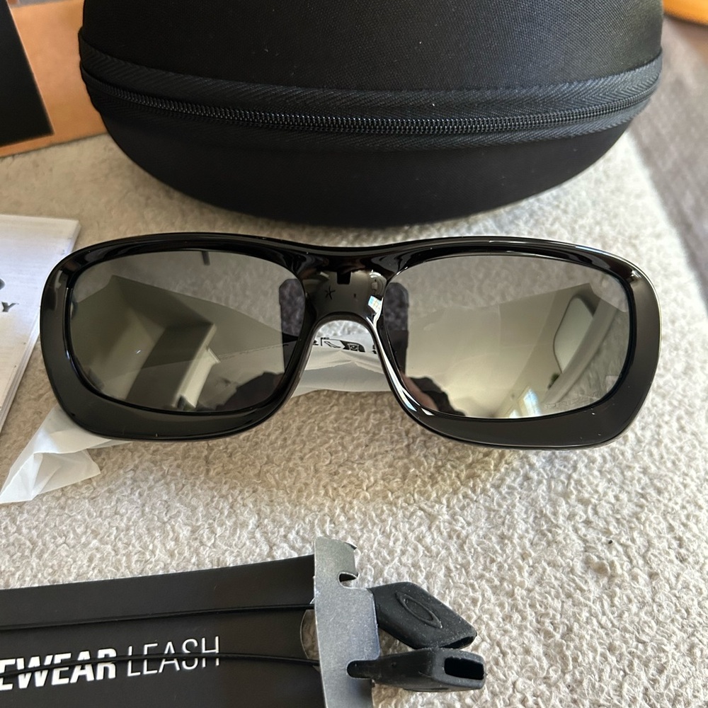 Oakley Black Sunglasses with Gray Lenses